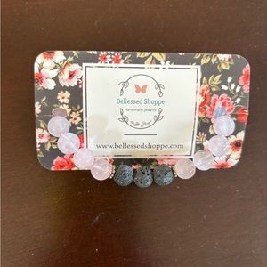 Pink beaded bracelet with lava beads. Can be used with Essential oils.  Nwt